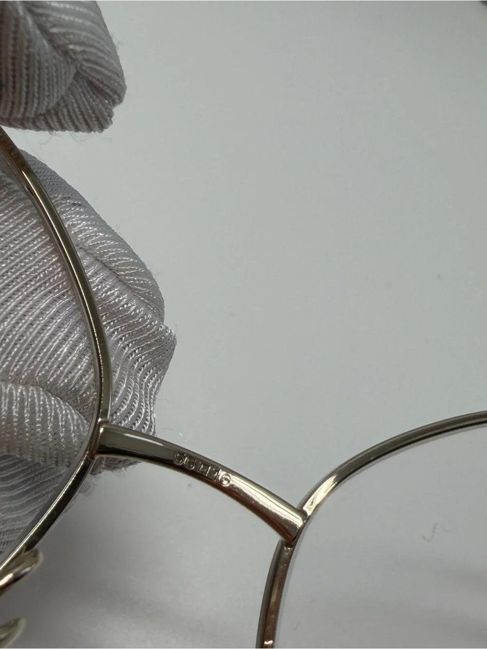 CHANEL  Gold and Black Eye ear Chain with Silver-Tone Glasses